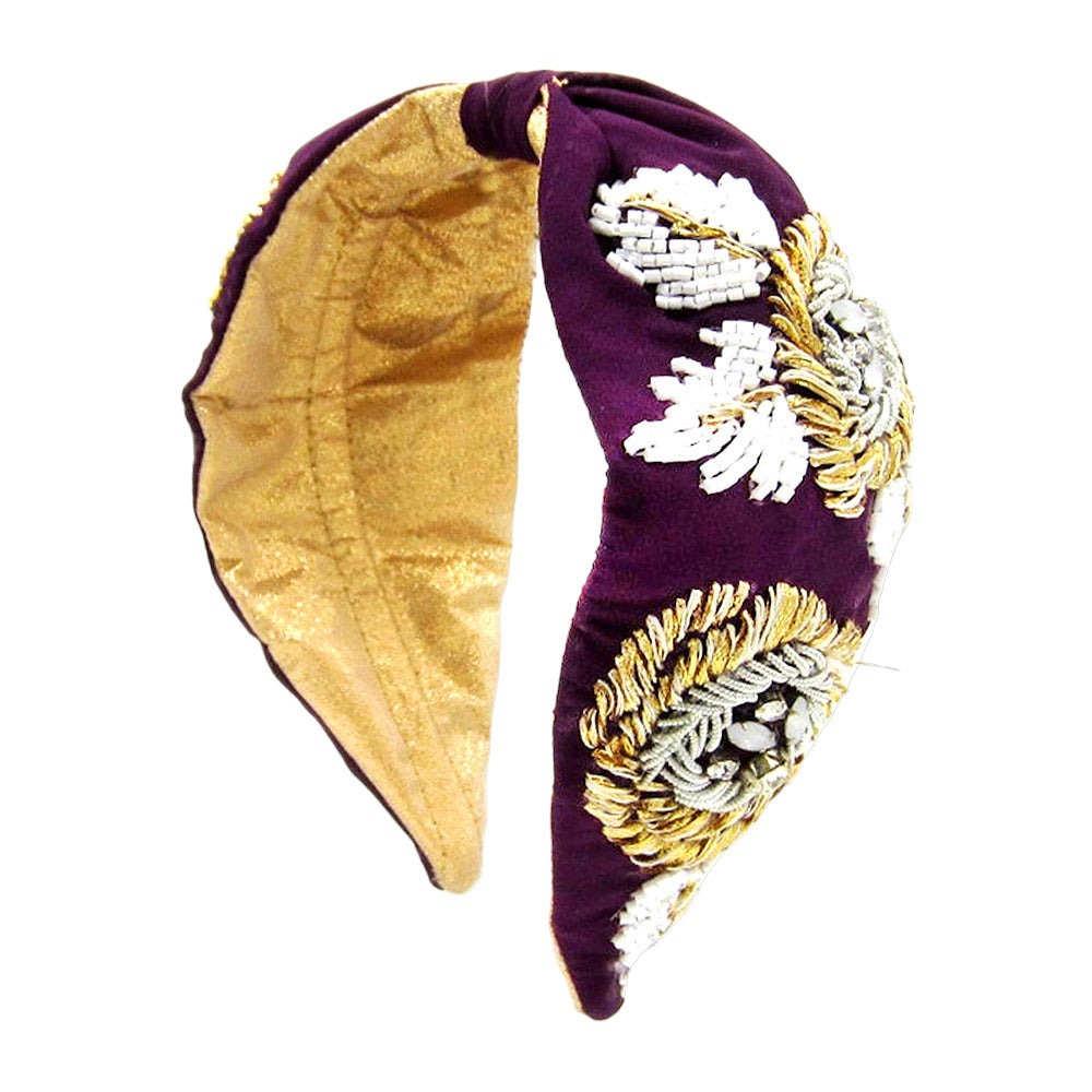 Violet headband with floral beaded embellishments, perfect for adding sophistication to any look.