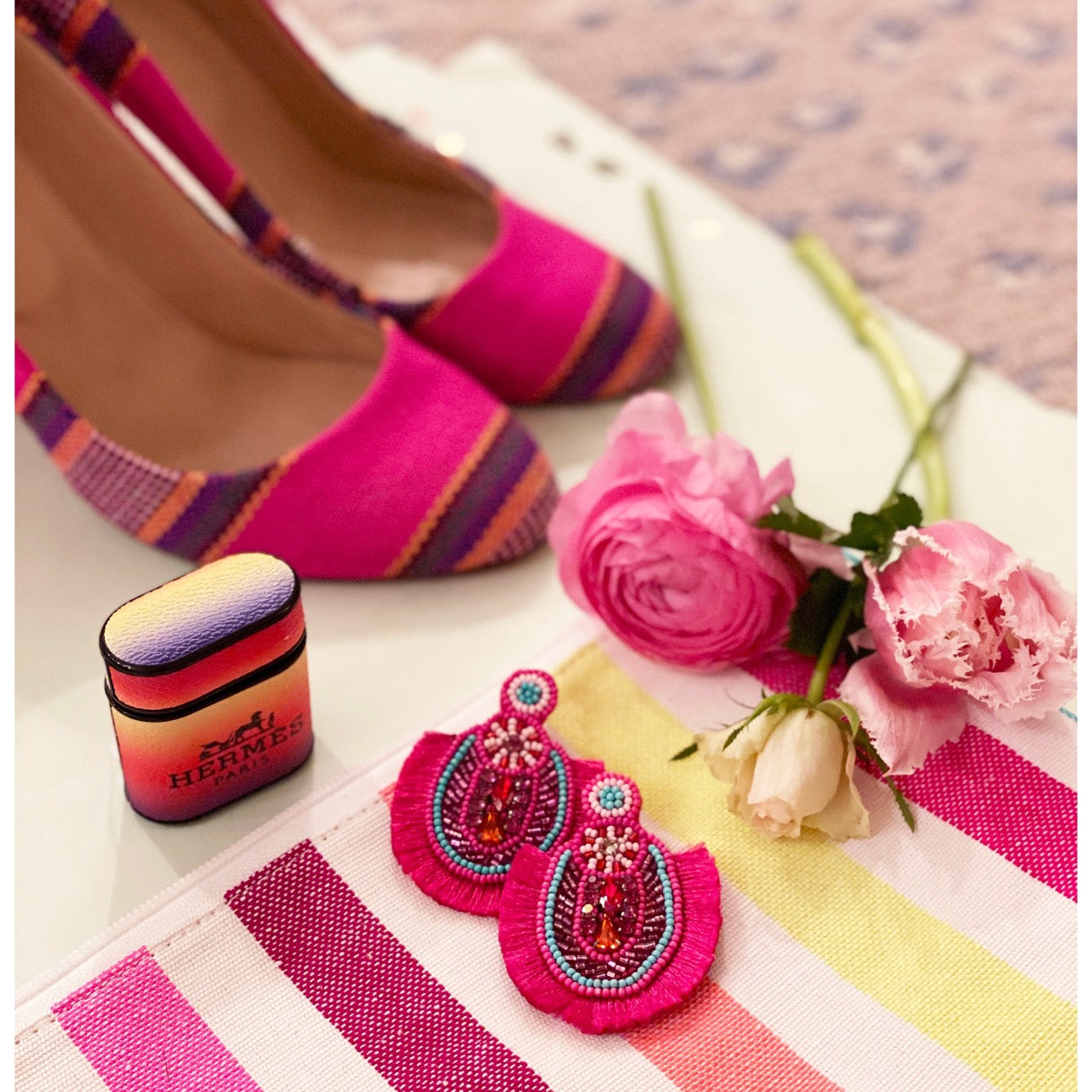 Bold and bright pink earrings with a unique design, ideal for making a fashion statement.