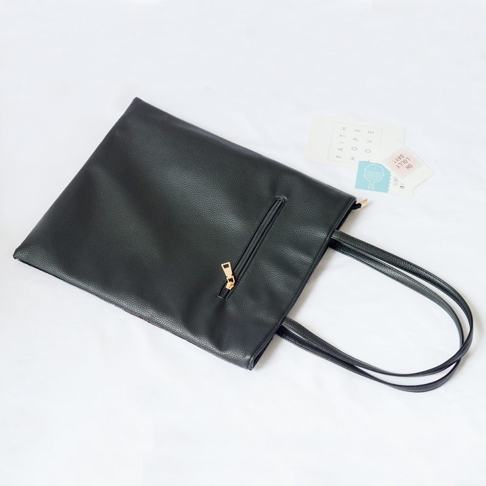 Fashion statement tote bag with sequins, offering a stylish and practical solution for everyday carry.