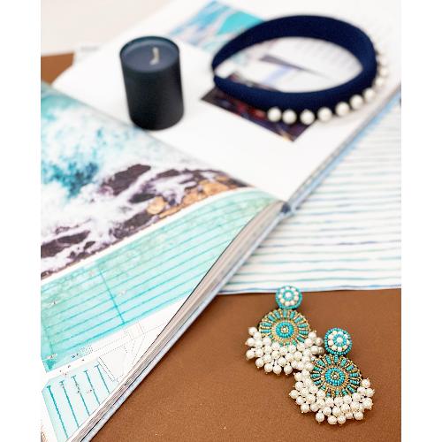 Artistic statement earrings with a "No Mistakes, Just Happy Accidents" Bob Ross patch and intricate blue beadwork.