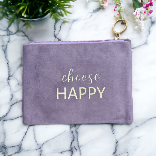 It features a top zipper closure and is large enough to hold all of your essentials, such as your phone, wallet, keys, and makeup.