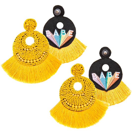 Fringe Benefits Yellow Earrings featuring vibrant yellow fringe, beaded design, and empowering "BABE" patch.
