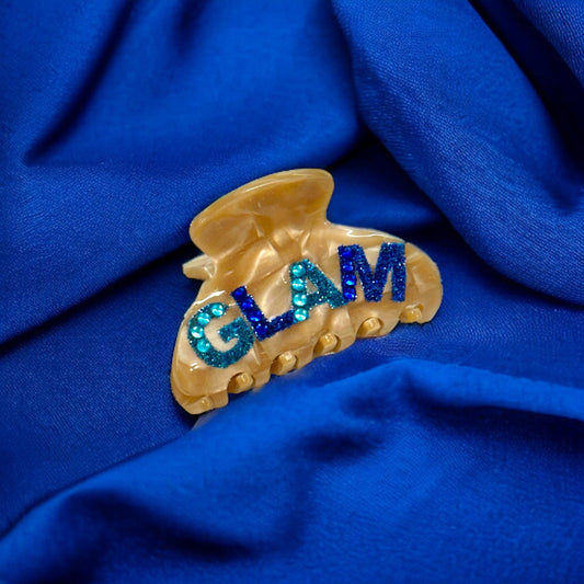 Glamorous hair clip with sparkling rhinestones and intricate patterns, ideal for adding a touch of elegance to any hairstyle. Keywords: glam hair clip, sparkling rhinestones, intricate patterns, elegant hairstyle