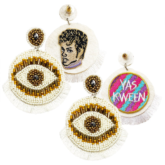 Beaded statement earrings featuring golden eye motif with ivory fringe and drop style