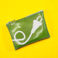 Small green zippered pouch for chargers and cords with sparkly finish and power cord print