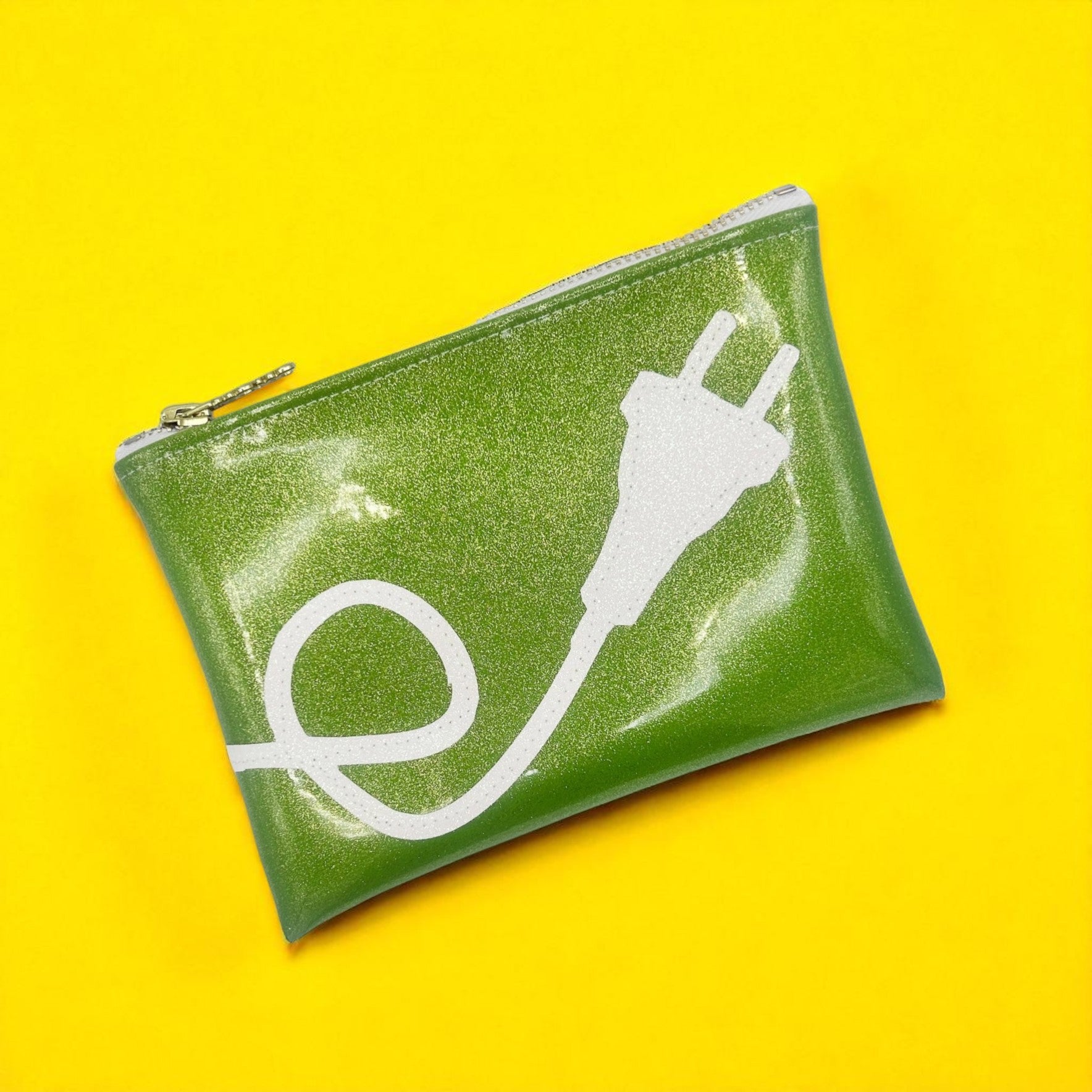 Small green zippered pouch for chargers and cords with sparkly finish and power cord print