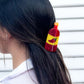 Colorful hair clip in a woman's hair