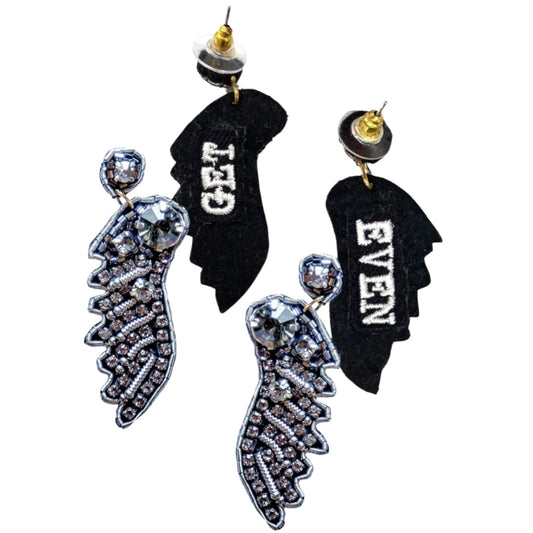 Black onyx earrings with unique wing design, perfect for adding an edgy touch to any outfit.