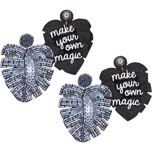 Mystical silver earrings featuring a palm reader and magic theme.