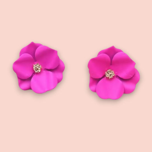 Pink flower earrings with sparkling detail.
