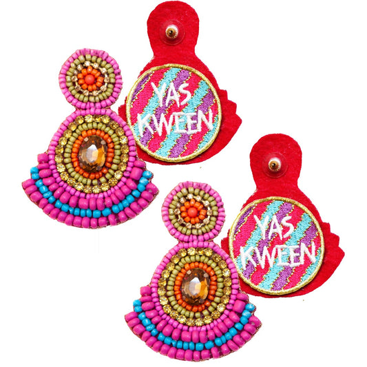 Handcrafted pink earrings with a vibrant hue and "Yas Queen" patch design, perfect for bold fashion statements.