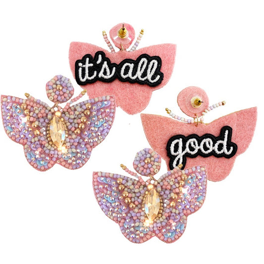 Sparkly butterfly earrings with pink sequins and unique "It’s All Good" patch, lightweight, bold style.