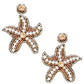 Beaded starfish statement earrings featuring a playful "Not Sorry" patch, ideal for a bold style.