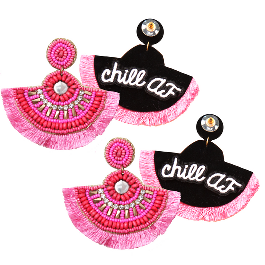 Pink fan earrings with fringe, beaded details, and "chill AF" embroidered graphic patches